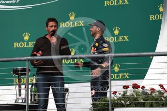 World © Octane Photographic Ltd. Gerard Butler with Red Bull Racing – Daniel Ricciardo (3rd). Sunday 23rd October 2016, F1 USA Grand Prix Podium, Austin, Texas – Circuit of the Americas (COTA). Digital Ref :1750LB1D4748