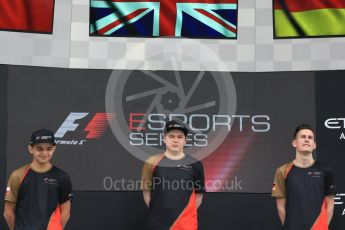 World © Octane Photographic Ltd. F1 eSports podium - Abu Dhabi, Yas Marina Circuit - 26 November 2017.Brendon Leigh (Champion), Fabrizio Donoso Delgado (2nd), Sven Zurner (3rd)