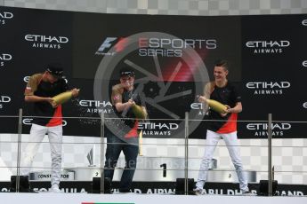 World © Octane Photographic Ltd. F1 eSports podium - Abu Dhabi, Yas Marina Circuit - 26 November 2017.Brendon Leigh (Champion), Fabrizio Donoso Delgado (2nd), Sven Zurner (3rd)