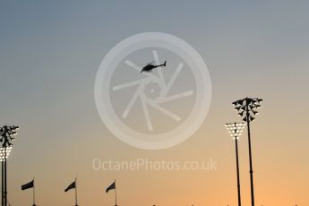 World © Octane Photographic Ltd. Formula 1 - Abu Dhabi Grand Prix - Friday - Practice 2. Helicopter flying at sunset. Yas Marina Circuit, Abu Dhabi. Friday 24th November 2017. Digital Ref: 2003CB1L6664