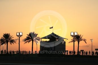 World © Octane Photographic Ltd. Formula 1 - Abu Dhabi Grand Prix - Friday - Practice 2. Fans with the setting sun behind them. Yas Marina Circuit, Abu Dhabi. Friday 24th November 2017. Digital Ref: 2003LB2D8573