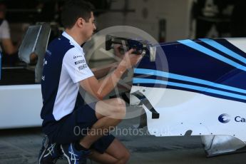 World © Octane Photographic Ltd. Formula 1 - Abu Dhabi Grand Prix - Thursday Setup. Williams Martini Racing FW40 T wing fitting. Yas Marina Circuit, Abu Dhabi. Thursday 23rd November 2017. Digital Ref:1996CB5D9058