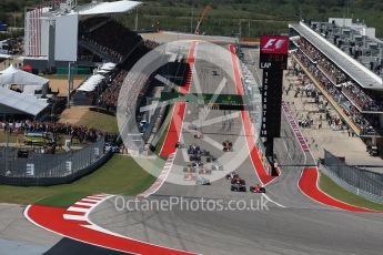 World © Octane Photographic Ltd. Formula 1 - American Grand Prix - Sunday - Race. Lewis Hamilton - Mercedes AMG Petronas F1 W08 EQ Energy+ starts on pole but Sebastian Vettel - Scuderia Ferrari SF70H makes a good move into Turn 1. Circuit of the Americas, Austin, Texas, USA. Sunday 22nd October 2017. Digital Ref: 1994LB2D7208