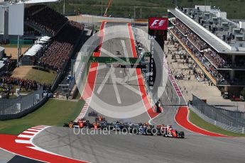 World © Octane Photographic Ltd. Formula 1 - American Grand Prix - Sunday - Race. Lewis Hamilton - Mercedes AMG Petronas F1 W08 EQ Energy+ starts on pole but Sebastian Vettel - Scuderia Ferrari SF70H makes a good move into Turn 1. Circuit of the Americas, Austin, Texas, USA. Sunday 22nd October 2017. Digital Ref: 1994LB2D7227