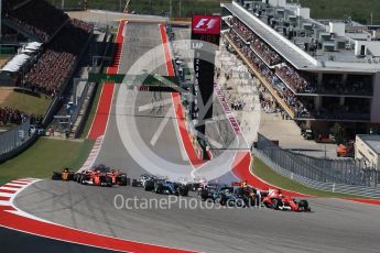 World © Octane Photographic Ltd. Formula 1 - American Grand Prix - Sunday - Race. Lewis Hamilton - Mercedes AMG Petronas F1 W08 EQ Energy+ starts on pole but Sebastian Vettel - Scuderia Ferrari SF70H makes a good move into Turn 1. Circuit of the Americas, Austin, Texas, USA. Sunday 22nd October 2017. Digital Ref: 1994LB2D7232