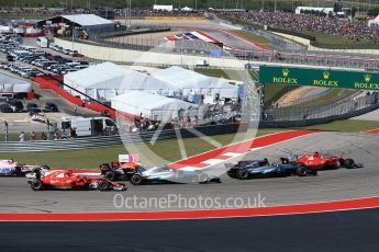 World © Octane Photographic Ltd. Formula 1 - American Grand Prix - Sunday - Race. Lewis Hamilton - Mercedes AMG Petronas F1 W08 EQ Energy+ starts on pole but Sebastian Vettel - Scuderia Ferrari SF70H makes a good move into Turn 1. Circuit of the Americas, Austin, Texas, USA. Sunday 22nd October 2017. Digital Ref: 1994LB2D7245