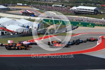 World © Octane Photographic Ltd. Formula 1 - American Grand Prix - Sunday - Race. Lewis Hamilton - Mercedes AMG Petronas F1 W08 EQ Energy+ starts on pole but Sebastian Vettel - Scuderia Ferrari SF70H makes a good move into Turn 1. Circuit of the Americas, Austin, Texas, USA. Sunday 22nd October 2017. Digital Ref: 1994LB2D7249