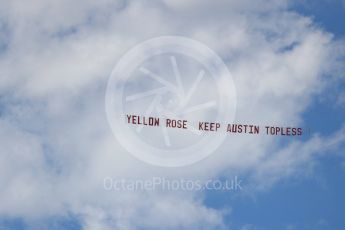 World © Octane Photographic Ltd. Formula 4 – F4 United States Championship - American Grand Prix – Race 1. Circuit of the Americas (COTA), Austin, Texas, USA. Saturday 21st October 2017. Yellow Rose - Keep Austin topless banner being flown from an aircraft. Digital Ref:1982LB1D6799
