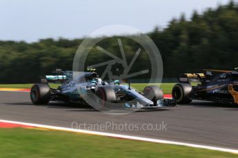 World © Octane Photographic Ltd. Formula 1 - Belgian Grand Prix - Friday - Practice 1. Valtteri Bottas - Mercedes AMG Petronas F1 W08 EQ Energy+ and Jolyon Palmer - Renault Sport F1 Team R.S.17. Circuit de Spa Francorchamps, Belgium. Friday 25th August 2017. Digital Ref:1922LB2D5871