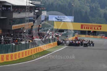 World © Octane Photographic Ltd. Formula 1 - Belgian Grand Prix - Race. The team crews clear the grid. Circuit de Francorchamps, Belgium. Sunday 27th August 2017. Digital Ref:1933LB1D8440