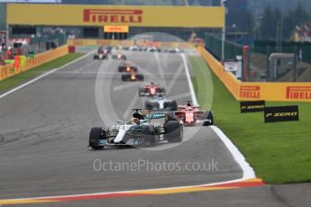 World © Octane Photographic Ltd. Formula 1 - Belgian Grand Prix - Race. Lewis Hamilton leaps Sebastian Vettel on lap 2. Circuit de Francorchamps, Belgium. Sunday 27th August 2017. Digital Ref:1933LB1D8592