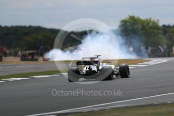 World © Octane Photographic Ltd. Formula 1 - British Grand Prix - Friday - Practice 2. Daniil Kvyat - Scuderia Toro Rosso STR12 spins off infront of a Williams. Silverstone, UK. Friday 14th July 2017. Digital Ref: 1884LB1D9026