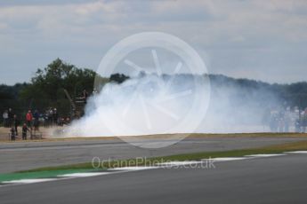 World © Octane Photographic Ltd. Formula 1 - British Grand Prix - Friday - Practice 2. Daniil Kvyat - Scuderia Toro Rosso STR12 spins off infront of a Williams. Silverstone, UK. Friday 14th July 2017. Digital Ref: 1884LB1D9033