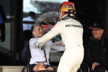 World © Octane Photographic Ltd. Formula 1 - British Grand Prix - Sunday - Race Podium. Lewis Hamilton - Mercedes AMG Petronas F1 W08 EQ Energy+ and Billy Monger #BillyWhizz. Silverstone, UK. Sunday 16th July 2017. Digital Ref: 1893LB1D4566