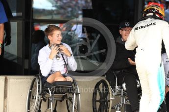 World © Octane Photographic Ltd. Formula 1 - British Grand Prix - Sunday - Race Podium. Lewis Hamilton - Mercedes AMG Petronas F1 W08 EQ Energy+ and Billy Monger #BillyWhizz. Silverstone, UK. Sunday 16th July 2017. Digital Ref: 1893LB1D4575