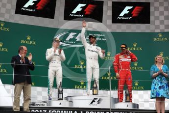 World © Octane Photographic Ltd. Formula 1 - British Grand Prix - Sunday - Race Podium. Lewis Hamilton and Valtteri Bottas - Mercedes AMG Petronas F1 W08 EQ Energy+ and Kimi Raikkonen - Scuderia Ferrari SF70H. Silverstone, UK. Sunday 16th July 2017. Digital Ref: 1893LB1D4687