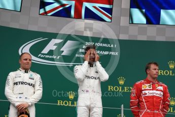 World © Octane Photographic Ltd. Formula 1 - British Grand Prix - Sunday - Race Podium. Lewis Hamilton and Valtteri Bottas - Mercedes AMG Petronas F1 W08 EQ Energy+ and Kimi Raikkonen - Scuderia Ferrari SF70H. Silverstone, UK. Sunday 16th July 2017. Digital Ref: 1893LB1D4732