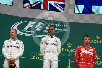 World © Octane Photographic Ltd. Formula 1 - British Grand Prix - Sunday - Race Podium. Lewis Hamilton and Valtteri Bottas - Mercedes AMG Petronas F1 W08 EQ Energy+ and Kimi Raikkonen - Scuderia Ferrari SF70H. Silverstone, UK. Sunday 16th July 2017. Digital Ref: 1893LB1D4752