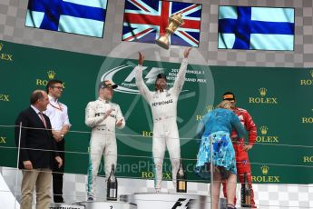 World © Octane Photographic Ltd. Formula 1 - British Grand Prix - Sunday - Race Podium. Lewis Hamilton and Valtteri Bottas - Mercedes AMG Petronas F1 W08 EQ Energy+ and Kimi Raikkonen - Scuderia Ferrari SF70H. Silverstone, UK. Sunday 16th July 2017. Digital Ref: 1893LB1D4837