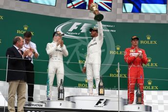 World © Octane Photographic Ltd. Formula 1 - British Grand Prix - Sunday - Race Podium. Lewis Hamilton and Valtteri Bottas - Mercedes AMG Petronas F1 W08 EQ Energy+ and Kimi Raikkonen - Scuderia Ferrari SF70H. Silverstone, UK. Sunday 16th July 2017. Digital Ref: 1893LB1D4863