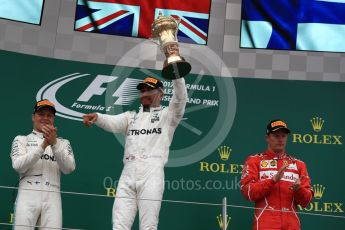 World © Octane Photographic Ltd. Formula 1 - British Grand Prix - Sunday - Race Podium. Lewis Hamilton and Valtteri Bottas - Mercedes AMG Petronas F1 W08 EQ Energy+ and Kimi Raikkonen - Scuderia Ferrari SF70H. Silverstone, UK. Sunday 16th July 2017. Digital Ref: 1893LB1D4869