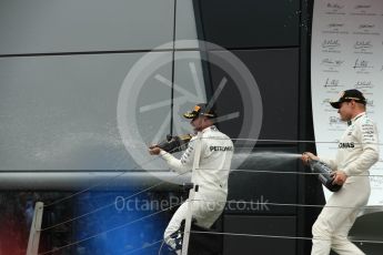 World © Octane Photographic Ltd. Formula 1 - British Grand Prix - Sunday - Race Podium. Lewis Hamilton and Valtteri Bottas Mercedes AMG Petronas F1 W08 EQ Energy+. Silverstone, UK. Sunday 16th July 2017. Digital Ref: 1893LB1D5004