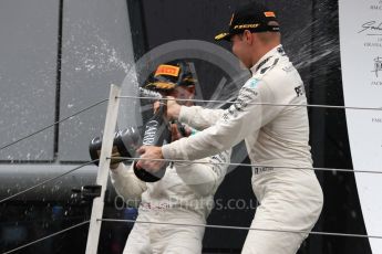 World © Octane Photographic Ltd. Formula 1 - British Grand Prix - Sunday - Race Podium. Lewis Hamilton and Valtteri Bottas - Mercedes AMG Petronas F1 W08 EQ Energy+ and Kimi Raikkonen - Scuderia Ferrari SF70H. Silverstone, UK. Sunday 16th July 2017. Digital Ref: 1893LB1D5046