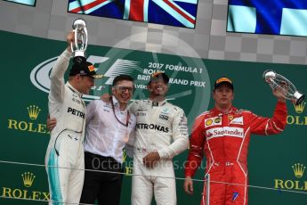 World © Octane Photographic Ltd. Formula 1 - British Grand Prix - Sunday - Race Podium. Lewis Hamilton and Valtteri Bottas - Mercedes AMG Petronas F1 W08 EQ Energy+ and Kimi Raikkonen - Scuderia Ferrari SF70H. Silverstone, UK. Sunday 16th July 2017. Digital Ref: 1893LB1D5144