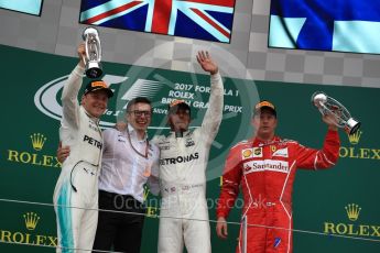 World © Octane Photographic Ltd. Formula 1 - British Grand Prix - Sunday - Race Podium. Lewis Hamilton and Valtteri Bottas - Mercedes AMG Petronas F1 W08 EQ Energy+ and Kimi Raikkonen - Scuderia Ferrari SF70H. Silverstone, UK. Sunday 16th July 2017. Digital Ref: 1893LB1D5149