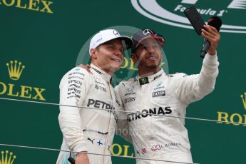 World © Octane Photographic Ltd. Formula 1 - British Grand Prix - Sunday - Race Podium. Lewis Hamilton and Valtteri Bottas Mercedes AMG Petronas F1 W08 EQ Energy+. Silverstone, UK. Sunday 16th July 2017. Digital Ref: 1893LB1D5303