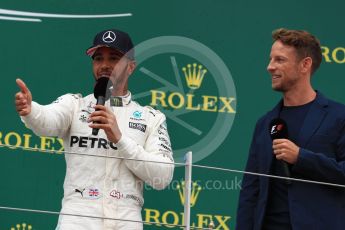 World © Octane Photographic Ltd. Formula 1 - British Grand Prix - Sunday - Race Podium. Lewis Hamilton - Mercedes AMG Petronas F1 W08 EQ Energy+ and Jenson Button. Silverstone, UK. Sunday 16th July 2017. Digital Ref: 1893LB1D5381