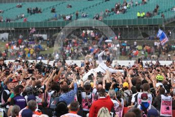 World © Octane Photographic Ltd. Formula 1 - British Grand Prix - Sunday - Race Podium. Lewis Hamilton - Mercedes AMG Petronas F1 W08 EQ Energy+ crowd surfs. Silverstone, UK. Sunday 16th July 2017. Digital Ref: 1893LB1D5469