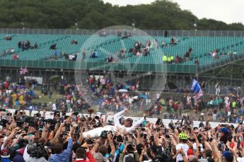 World © Octane Photographic Ltd. Formula 1 - British Grand Prix - Sunday - Race Podium. Lewis Hamilton - Mercedes AMG Petronas F1 W08 EQ Energy+ crowd surfs. Silverstone, UK. Sunday 16th July 2017. Digital Ref: 1893LB1D5496