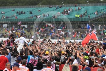 World © Octane Photographic Ltd. Formula 1 - British Grand Prix - Sunday - Race Podium. Lewis Hamilton - Mercedes AMG Petronas F1 W08 EQ Energy+ crowd surfs. Silverstone, UK. Sunday 16th July 2017. Digital Ref: 1893LB1D5540
