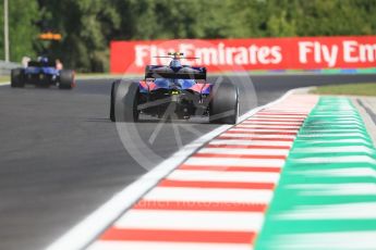 World © Octane Photographic Ltd. Formula 1 - Hungarian Grand Prix Practice 1. Marcus Ericsson – Sauber F1 Team C36 and Carlos Sainz - Scuderia Toro Rosso STR12. Hungaroring, Budapest, Hungary. Friday 28th July 2017. Digital Ref: