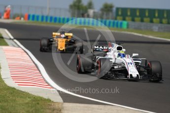 World © Octane Photographic Ltd. Formula 1 - Hungarian Grand Prix Practice 1. Felipe Massa - Williams Martini Racing FW40 and Nico Hulkenberg - Renault Sport F1 Team R.S.17. Hungaroring, Budapest, Hungary. Friday 28th July 2017. Digital Ref:1899CB1L9215