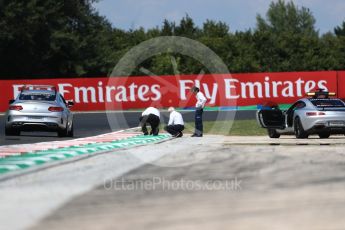 World © Octane Photographic Ltd. Formula 1 - Hungarian Grand Prix Practice 2. Laurent Mekies FIA safety director and Charlie Whiting FIA Formula One Race Director inspect the new Turn 4 kurbs. Hungaroring, Budapest, Hungary. Friday 28th July 2017. Digital Ref:1901LB1D7611