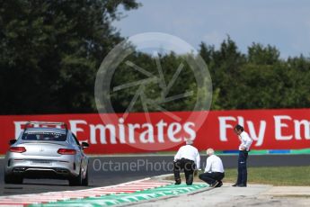 World © Octane Photographic Ltd. Formula 1 - Hungarian Grand Prix Practice 2. Laurent Mekies FIA safety director and Charlie Whiting FIA Formula One Race Director inspect the new Turn 4 kurbs. Hungaroring, Budapest, Hungary. Friday 28th July 2017. Digital Ref:1901LB1D7615