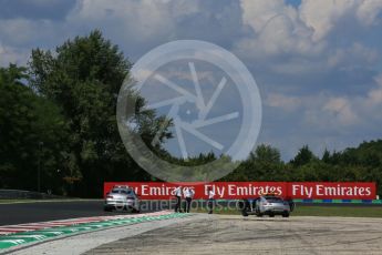 World © Octane Photographic Ltd. Formula 1 - Hungarian Grand Prix Practice 2. Laurent Mekies FIA safety director and Charlie Whiting FIA Formula One Race Director inspect the new Turn 4 kurbs. Hungaroring, Budapest, Hungary. Friday 28th July 2017. Digital Ref:1901LB5D2384