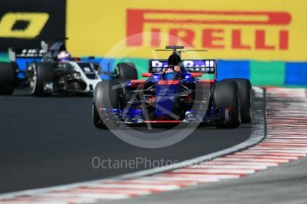 World © Octane Photographic Ltd. Formula 1 - Hungarian Grand Prix Practice 3. Daniil Kvyat - Scuderia Toro Rosso STR12 and Romain Grosjean - Haas F1 Team VF-17. Hungaroring, Budapest, Hungary. Saturday 29th July 2017. Digital Ref: