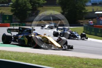 World © Octane Photographic Ltd. Formula 1 - Hungarian Grand Prix Practice 3. Jolyon Palmer - Renault Sport F1 Team R.S.17 and Kevin Magnussen - Haas F1 Team VF-17. Hungaroring, Budapest, Hungary. Saturday 29th July 2017. Digital Ref:1908CB2D1825