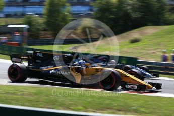 World © Octane Photographic Ltd. Formula 1 - Hungarian Grand Prix Practice 3. Jolyon Palmer - Renault Sport F1 Team R.S.17 and Kevin Magnussen - Haas F1 Team VF-17. Hungaroring, Budapest, Hungary. Saturday 29th July 2017. Digital Ref:1908CB2D1829