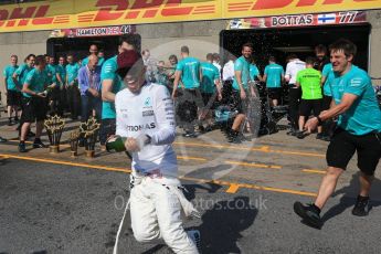 World © Octane Photographic Ltd. Formula 1 - Canadian Grand Prix - Sunday Race. Lewis Hamilton and Valtteri Bottas - Mercedes AMG Petronas F1 Team Celebration after wining Canadian GP. Circuit Gilles Villeneuve, Montreal, Canada. Sunday 11th June 2017. Digital Ref: 1859LB2D4044