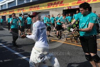 World © Octane Photographic Ltd. Formula 1 - Canadian Grand Prix - Sunday Race. Lewis Hamilton and Valtteri Bottas - Mercedes AMG Petronas F1 Team Celebration after wining Canadian GP. Circuit Gilles Villeneuve, Montreal, Canada. Sunday 11th June 2017. Digital Ref: 1859LB2D4048