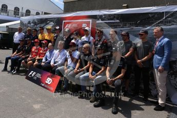 World © Octane Photographic Ltd. Formula 1 – 50 years of F1 in Canada – Class of 2017 - Driver Group Photo. Kimi Raikkonen, Ferrari, Sebastian Vettel, Ferrari, Valtteri Bottas, Mercedes AMG, Lewis Hamilton, Mercedes AMG, Daniel Ricciardo, Red Bull Racing, Max Verstappen, Red Bull, Sergio Perez, Force India, and Esteban Ocon, Force India. Stoffel Vandoorne, McLaren, Fernando Alonso, McLaren, Felipe Massa, Williams Martini Racing, Lance Stroll, Williams Martini Racing, Nico Hulkenberg, Renault and Jolyon Palmer, Renault Sport F1. Kevin Magnussen, Haas F1, Romain Grosjean, Haas F1, Daniil Kvyat, Toro Rosso, Carlos Sainz Jr, Toro Rosso, Marcus Ericsson, Sauber and Pascal Wehrlein, Sauber with Ross Brawn, Chase Carey and Jean Todt. Circuit Gilles Villeneuve, Montreal, Canada. Sunday 11th June 2017. Digital Ref: 1856LB2D3259