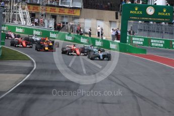 World © Octane Photographic Ltd. Formula 1 - Canadian Grand Prix - Sunday Race. Lewis Hamilton - Mercedes AMG Petronas F1 W08 EQ Energy+ leads the race start. Circuit Gilles Villeneuve, Montreal, Canada. Sunday 11th June 2017. Digital Ref: 1857LB1D7662