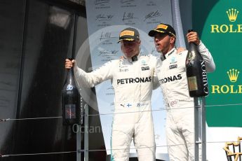 World © Octane Photographic Ltd. Formula 1 - Canadian Grand Prix - Sunday Race - Podium. Lewis Hamilton - Mercedes AMG Petronas F1 W08 EQ Energy+ and Valtteri Bottas. Circuit Gilles Villeneuve, Montreal, Canada. Sunday 11th June 2017. Digital Ref: 1858LB1D8752