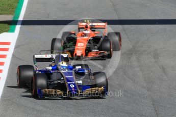 World © Octane Photographic Ltd. Formula 1 - Spanish Grand Prix Practice 1. Marcus Ericsson – Sauber F1 Team C36 and Stoffel Vandoorne - McLaren Honda MCL32. Circuit de Barcelona - Catalunya, Spain. Friday 12th May 2017. Digital Ref: 1810CB1L7720
