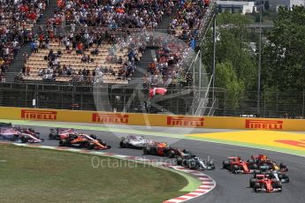 World © Octane Photographic Ltd. Formula 1 - Spanish Grand Prix Race. First lap drama, Vettel leads Hamilton ahead of Bottas and Raikkonen and Verstappen are about to make contact. Circuit de Barcelona - Catalunya, Spain. Sunday 14th May 2017. Digital Ref:1825LB1D3828