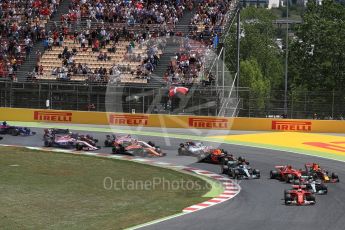 World © Octane Photographic Ltd. Formula 1 - Spanish Grand Prix Race. First lap drama, Vettel leads Hamilton ahead of Bottas and Raikkonen and Verstappen make contact. Circuit de Barcelona - Catalunya, Spain. Sunday 14th May 2017. Digital Ref:1825LB1D3830
